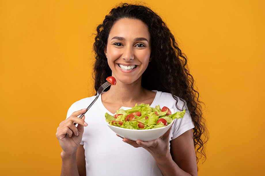 portrait-of-smiling-latin-lady-holding-plate-with-2023-11-27-04-53-23-utc (1)